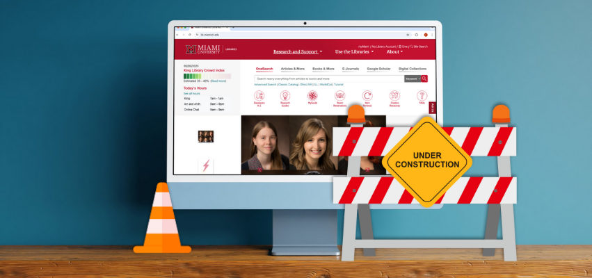 AI create image of library website on a mac desktop computer with an orange and white cone and an under construction sign in front